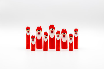 Frohe Weihnachten/ Nikoläuse/ Weihnachtsmänner