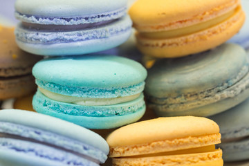 Close up of colorful french dessert macarons on a plate