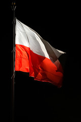 Flag of Poland on the mast at night. On the 11 November 2018 is the 100th anniversary of regaining...