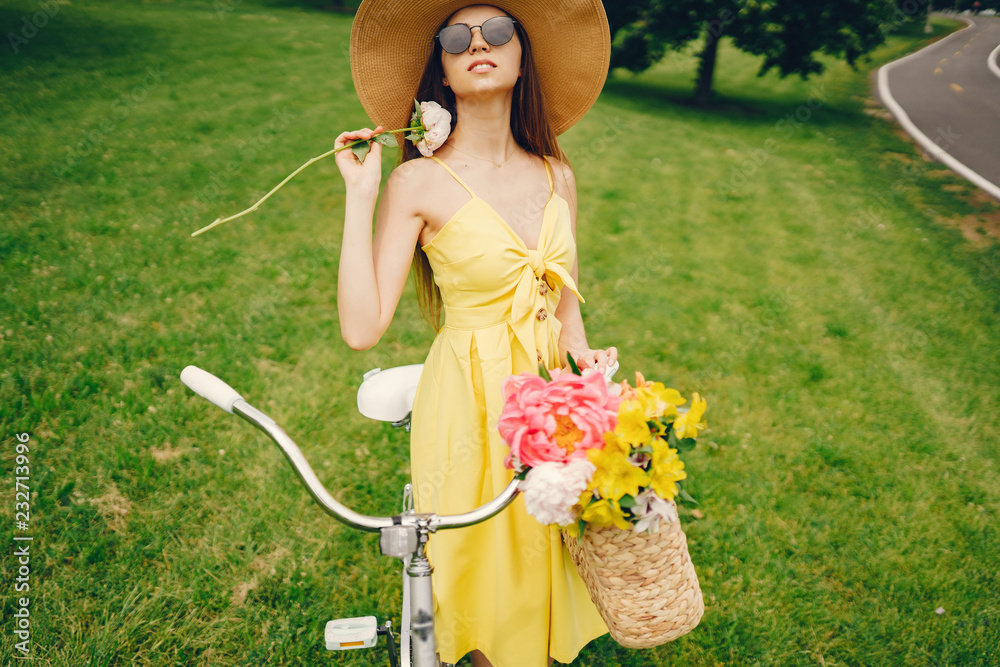 Wall mural pretty girl with bicycle