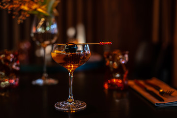 Coctail with Black Olive on the Stick