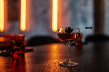 Coctail with Black Olive on the Stick