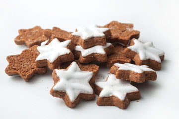 closeup of christmas biscuit in shaped star on white background