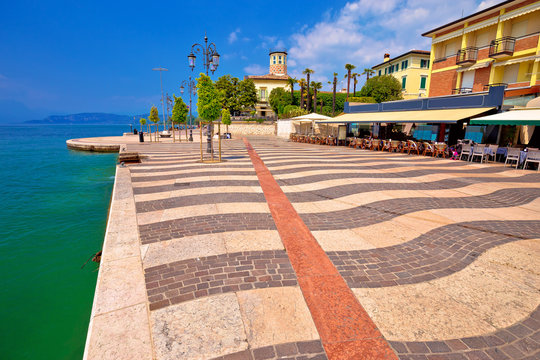 Garda lake turquoise waterfront in town of of Lasize view