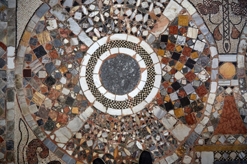 antique old stone mosaic floor pattern