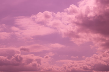 Sky clouds purple background