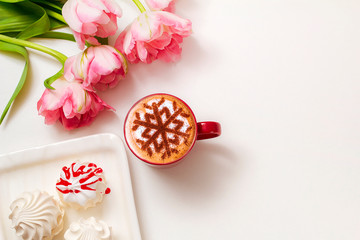 Cappuccino with a pattern of snowflakes as