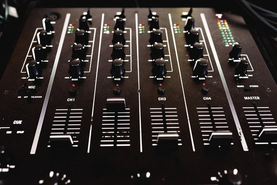 Control panel with sliders of an audio mixer for DJ