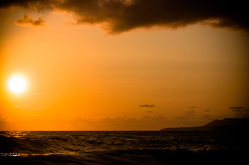 Amazing sea sunset, the sun, waves, clouds