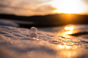Snowman at sunset