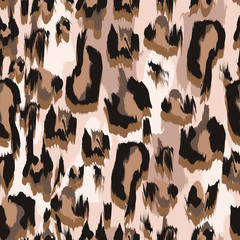 Seamless pattern with leopard skin. Vector. © Yumeee