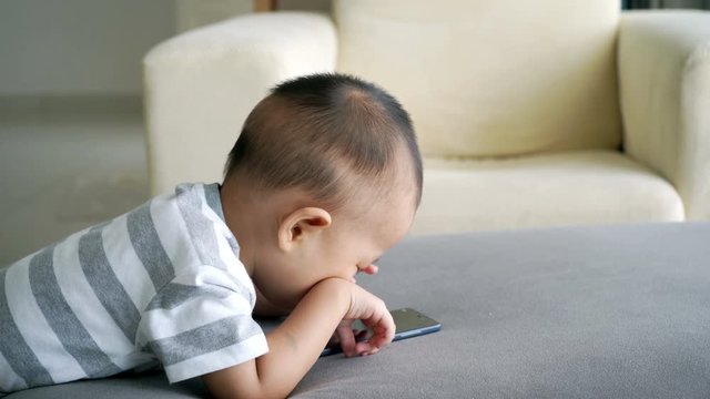 Child using smart phone