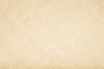 Brown Mat Traditional handicraft bamboo weave texture background. Wicker surface pattern material for wall with antique cracking furniture painted weathered white vintage peeling wallpaper or board.