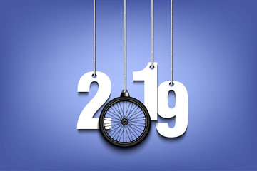 2019 New Year and bicycle wheel hanging on strings