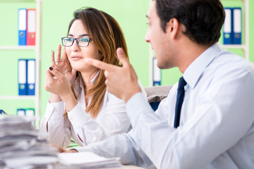 Two colleagues working in the office