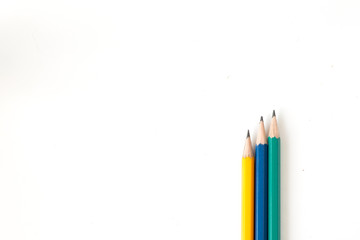 Tree pencils multi-colour on white background for useful like concept business, education and art background