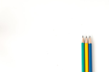 Tree pencils multi-colour on white background for useful like concept business, education and art background