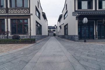 Fototapeta premium Empty road near vintage building in Nanjing