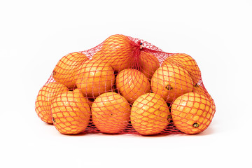 Netted bag of tangerines, isolated on white background.