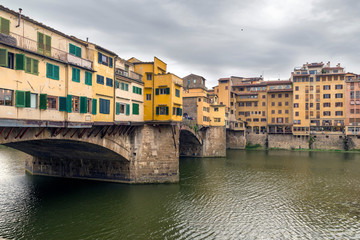 Fototapeta na wymiar FLORENCE, ITALY - OCTOBER 28, 2018: Beautiful view of the Ponte Vecchio bridge across the Arno River