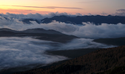 Beautiful sunrise with fog in the mountains