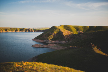 sunset on coast of sea