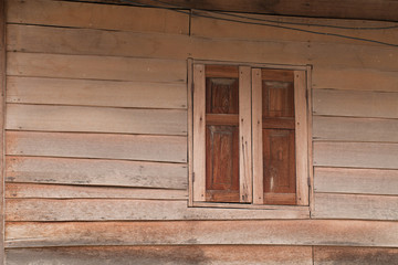 Naklejka na ściany i meble Old wooden wall with window