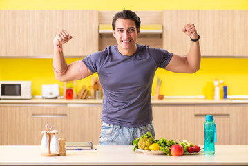 Young man in dieting and healthy eating concept