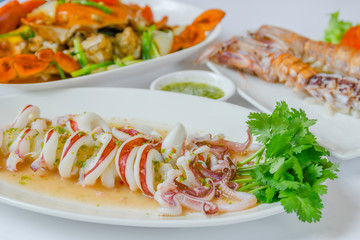 Squid topped with fresh seafood