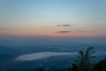 Fog and sun Morning after mountain at Phu Soi Dao National Park, Uttaradit in Thailand.