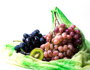 grapes in a bowl isolated on white background