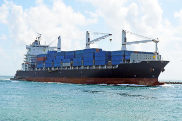 Fototapeta premium container ship approaching the Port of Miami a Latin America trading hub.