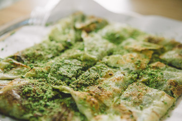 Traditional Turkish Dessert Katmer, pistachio, clotted cream, dough