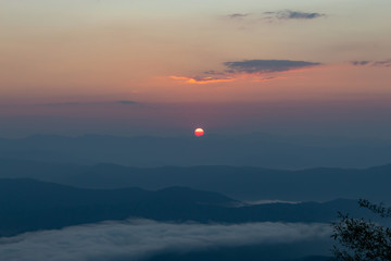 Fog and sun Morning after mountain at Phu Soi Dao National Park, Uttaradit in Thailand.