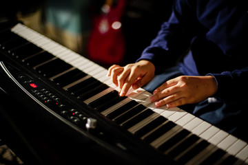 Hands playing on musical instrument | Electric piano
