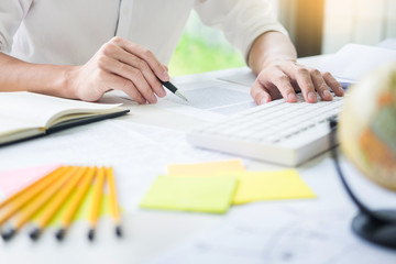 Attractive business man working on laptop at modern office For His New Project conferencing with tutor, education concept