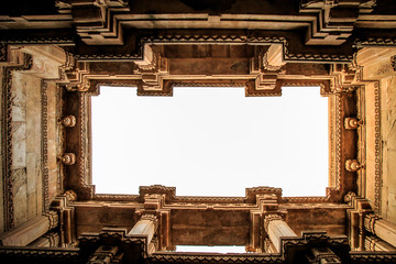 Fototapeta na wymiar Inner view of Adalaj Ni Vav (Stepwell) or Rudabai Stepwell. Built in 1498 by Rana Veer Singh is five stories deep. Ahmedabad, Gujarat, India