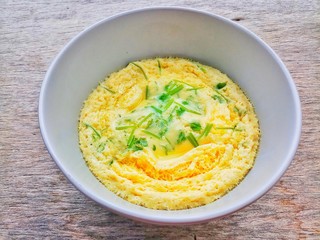 Steamed Eggs in bowl on wooden background