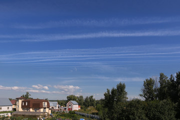 Traces on a clear blue sky.