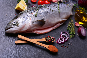 Fish salmon with spices and vegetables