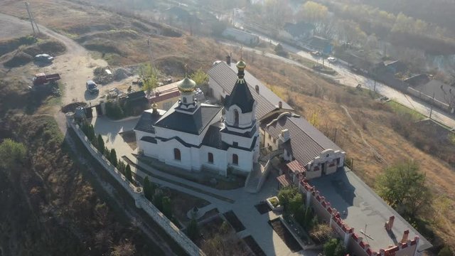 Republic of Moldova Old Orhei Monastery and Butuceni Village aerial view at sunrise