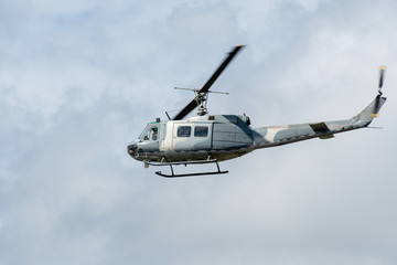 Fototapeta na wymiar Military helicopter flying in the air.