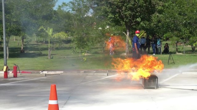 Fire training by a firefighter who carefully