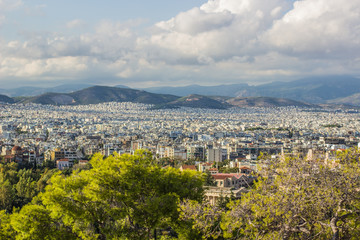 big over crowded south city view in cloudy sky weather time before storm on mountain horizon background silhouettes landscape 