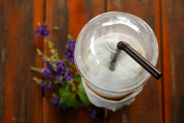 Glass of Cold Iced Coffee put on old table