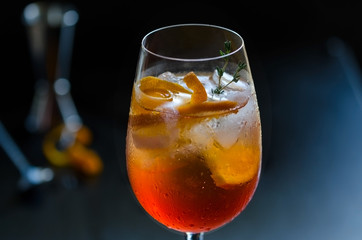 Alcoholic cocktail Aperol Stpritz , prepared with prosecco or champagne wine, a dash of some bitter liqueur and sparkling mineral water.Copy space.
