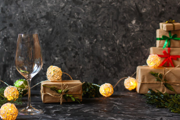 Happy New Year! Traditional New Year's ritual with champagne and gifts. Top view