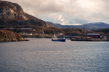 Fototapeta premium Norway water transportation during ice cold winter time