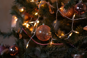 Beautiful color christmas decorations hanging on christmas tree with shiny glare