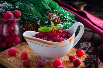 Cranberry Sauce on a wooden board, horizontal